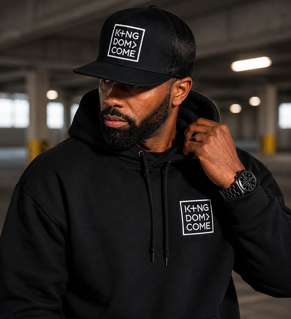 Man wearing the black Kingdom Come cap
